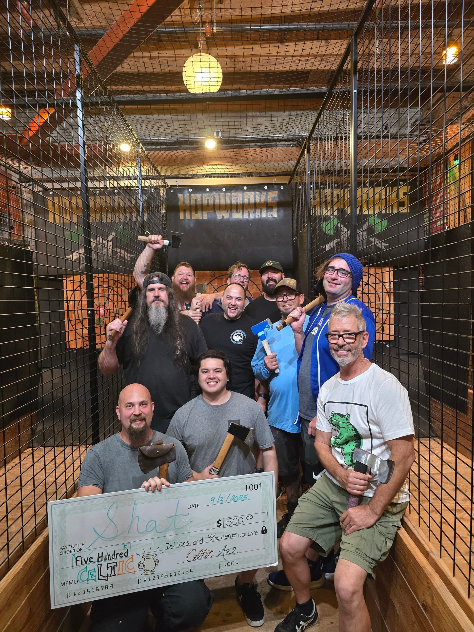 Group celebrating with $500 Celtic Cup check